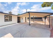 Charming home featuring a covered carport and desert landscaping at 2878 El Cajon St, Las Vegas, NV 89169