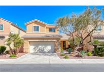 Charming two-story home with desert landscaping, two-car garage, and a welcoming facade under a clear blue sky at 7012 Mercurio Ave, Las Vegas, NV 89131