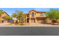 Charming two-story home featuring a three car garage, balcony, and desert landscaping at 7354 Strutting Silver Ct, Las Vegas, NV 89131