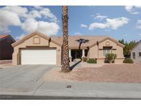 Charming single-story home with desert landscaping and a spacious two-car garage at 8904 Marble Dr, Las Vegas, NV 89134