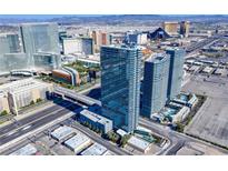 A stunning aerial view of The Martin condominium towers overlooking the Las Vegas skyline at 4471 Dean Martin Dr # 1707, Las Vegas, NV 89103
