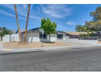 Charming single-story home featuring a well-maintained yard and inviting curb appeal on a sunny day at 4608 Diamond Head Dr, Las Vegas, NV 89110
