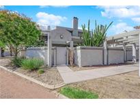 Charming townhome with a private courtyard, xeriscape landscaping, and a freshly painted exterior at 5526 Orchard Ln # 0, Las Vegas, NV 89110