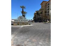 Elegant Boca Raton condominiums entrance with lush landscaping and decorative signage at 2455 W Serene Ave # 709, Las Vegas, NV 89123
