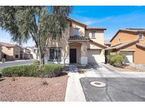 Charming two-story home with tile roof, desert landscaping, and an attached two-car garage at 5783 Sol Vista Ave, Las Vegas, NV 89122