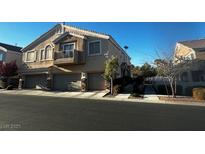 Attractive multi-Gathering townhome featuring a private balcony and three garage spaces at 9078 Camp Light Ave # 102, Las Vegas, NV 89149