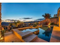 Backyard pool and spa featuring views of the Las Vegas valley at 19 Hilltop Crest St, Henderson, NV 89011