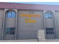 Exterior of Craigmont Villas with address marker and balcony railing along upper floor at 4300 N Lamont St # 225, Las Vegas, NV 89115