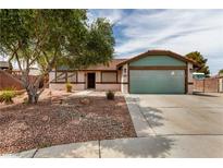 Charming single-story home featuring desert landscaping, a two-car garage, and a welcoming entrance at 1816 Mazzanti Way, Henderson, NV 89014