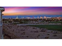 Enjoy stunning sunset views of the Las Vegas skyline from this homes beautiful vantage point overlooking the golf course at 9213 Las Manaitas Ave # 401, Las Vegas, NV 89144