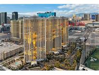 Beautiful high rise with elegant architecture, lovely manicured landscaping, and a sparkling blue pool for luxury living at 135 E Harmon Ave # 3320, Las Vegas, NV 89109
