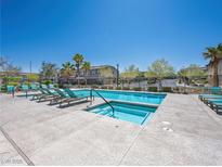 Community pool and lounge chairs perfect for relaxing and soaking up the sun at 8701 Giant Causeway Ave, Las Vegas, NV 89148
