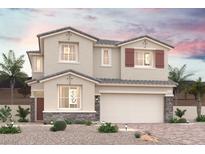Charming two-story home featuring a neutral color palette, stone accents, and a well-manicured desert landscape at 5136 Eagle Way, North Las Vegas, NV 89031