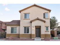 Charming two-story home with a well-maintained stucco exterior and inviting front entrance at 649 Ryan Peak Ln, Henderson, NV 89011