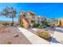Inviting condo exterior boasting well-maintained landscaping, and a desert theme at 8070 W Russell Rd # 1088, Las Vegas, NV 89113