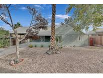 Charming single-story home with desert landscaping and a covered front porch at 1225 S 15Th St, Las Vegas, NV 89104