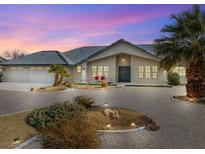 Charming single-story home with a well-manicured yard and circular driveway in a rural setting at 1251 Cavalry St, Pahrump, NV 89048