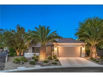 Charming single-story home with a well-manicured front yard and a two-car garage at 2248 Carrizo Way, Henderson, NV 89052