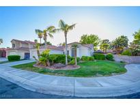 Charming single-story home boasting a lush lawn, mature landscaping, and delightful curb appeal at 4517 Inez Dr, Las Vegas, NV 89130