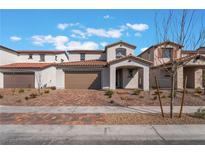 Charming two-story home featuring a tile roof, spacious two-car garage, and inviting curb appeal at 190 May Park Ave, Henderson, NV 89011