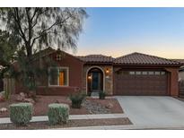 Charming single-story home with a well-maintained front yard and attached two car garage at 8113 Bay Colony St, Las Vegas, NV 89131