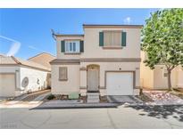 Charming two-story home with green shutters and a well-maintained front yard at 9958 Fragile Fields St, Las Vegas, NV 89183
