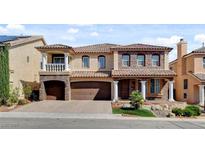 Charming two-story home with a landscaped yard and a three-car garage at 6236 Mount Palomar Ave, Las Vegas, NV 89139