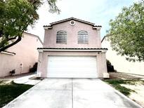 Charming two-story home with a two-car garage and well-maintained front yard at 5359 Harvest Breeze Rd, Las Vegas, NV 89118