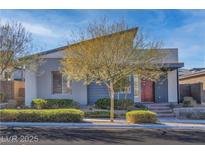 Charming single-story home with unique architectural design and well-manicured front yard landscaping at 2494 Veronella St, Henderson, NV 89044