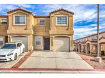 Inviting townhome featuring a private garage and convenient driveway space at 2620 Sierra Seco Ave # 101, Las Vegas, NV 89106