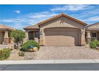 Charming single-story home featuring a well-manicured front yard and a two-car garage with a paved driveway at 6160 Majestic Wind Ave, Las Vegas, NV 89122
