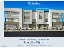 Modern three-story townhome with white and beige exterior, showcasing a contemporary design at 654 Agate Bridge St, Las Vegas, NV 89138