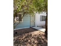 Charming single-Gathering home with well-maintained front yard with secure door at 158 Greenbriar Townhouse Way, Las Vegas, NV 89121