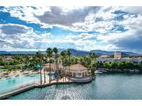 Stunning lakefront community with sandy beach, lush landscaping, and beautiful clubhouse at 3151 Soaring Gulls Dr # 2035, Las Vegas, NV 89128
