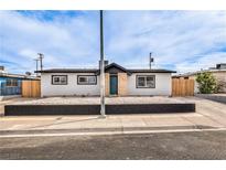 Charming single-story home with a minimalist front yard and a welcoming entrance at 4957 E Harmon Ave, Las Vegas, NV 89121