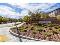 Inviting Barrington at Providence community entrance with lush landscaping and clear signage on a sunny day at 7237 Puddle Duck St, Las Vegas, NV 89166