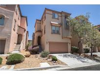 Two-story home with a landscaped front yard and attached garage at 6652 Weeping Pine St, Las Vegas, NV 89149