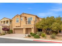 Charming two-story home featuring a tile roof, a small balcony, and a well-maintained front yard at 4212 Hawks Glide Ave, North Las Vegas, NV 89084