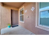 Inviting front door with succulent decor and a 'hello' door mat at 8101 W Flamingo Rd # 2059, Las Vegas, NV 89147
