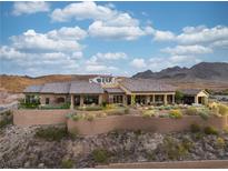 Spacious house with a beautiful desert landscape and a stunning mountain view in the background at 1123 Christian Rd, Henderson, NV 89002