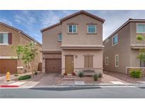 Charming two-story home with brick driveway, desert landscaping and covered front porch at 5256 Sherwood Forest Ln, Las Vegas, NV 89122