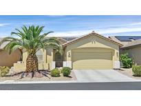 Charming single-story home with desert landscaping and a welcoming two-car garage in a sunny neighborhood at 6072 Canter Glen Ave, Las Vegas, NV 89122