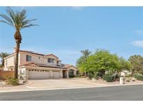 Two-story home featuring a three-car garage, tiled roof, solar panels, and circular driveway with mature landscaping at 8104 Wispy Sage Way, Las Vegas, NV 89149