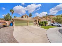 Charming single-story home features a well-manicured lawn, spacious driveway, and a three-car garage in a desirable location at 4878 Friar Tuck Ave, Las Vegas, NV 89130
