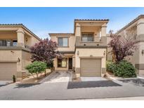 Inviting two-story townhome with a one car garage and charming balcony at 9737 Darlington Ct, Las Vegas, NV 89149