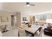 Inviting living room with comfortable seating, modern decor, and a dining area at 220 E Flamingo Rd # 111, Las Vegas, NV 89169