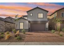 Charming two-story home featuring a brick driveway and well-manicured landscaping at 4347 Outlook Vista Ave, North Las Vegas, NV 89084