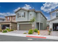 Inviting two-story home with a two-car garage, tidy landscaping, and charming architectural details at 4698 Lucky Jade Ave, Las Vegas, NV 89141