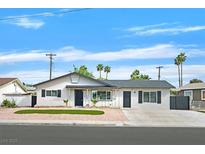Charming single-story home with a minimalist front yard and desert landscaping at 3124 Glenhurst Dr, Las Vegas, NV 89121