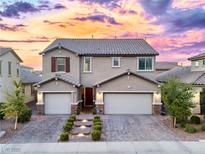 Inviting two-story home boasting a two-car garage and beautifully paved driveway at 3846 W Neal Ave, Las Vegas, NV 89141